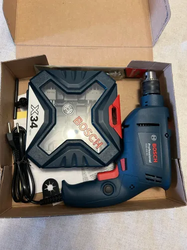 Furadeira Bosch Professional GSB 450 RE 450W 220V + maleta X-Line com 34 acessórios