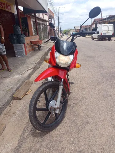 Moto impecável.