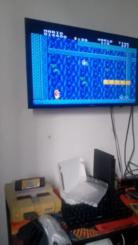 Super Nintendo com cartucho overdrive