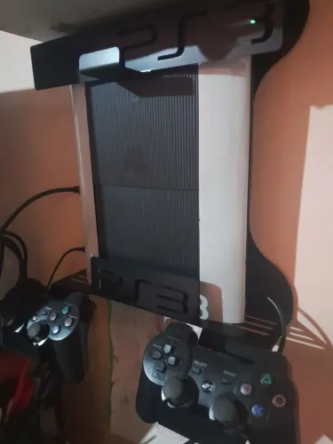 Ps3 Super slim 500gb 2 controle sem fio com mais de 15 jogos excelente estado