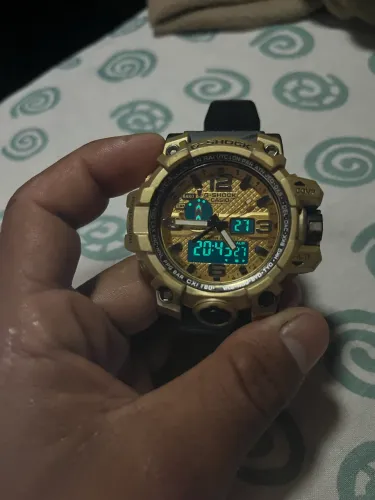 relógio g-shock mudmaster preto e dourado