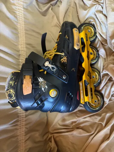 Patins oxer freestyle preto e dourado