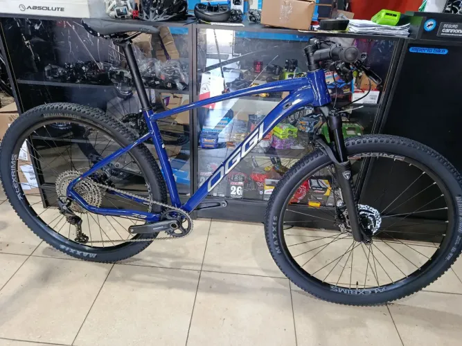 Bike aro 29 Oggi 7.3 com grupo Shimano DEORE 14 meses de seguro Grátis