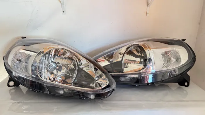 Par de farol Fiat Punto 2012/2017 original 