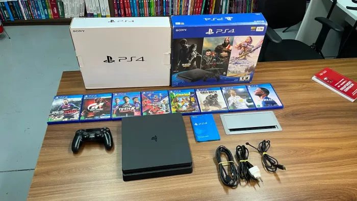 Playstation 4 1TB + 1 Controle Original + caixa + manual + 7 jogos