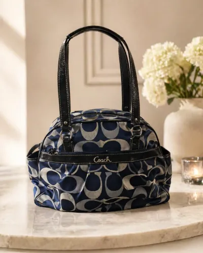 Bolsa Coach feminina azul-marinho