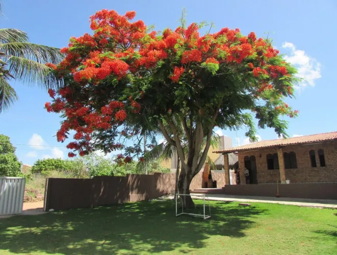 Casa com 3 dormitórios à venda, 460 m² por R$ 890.000,00 - Praia de Carapibus - Conde/PB