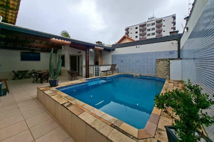 Casa com 4 dormitórios à venda, 175 m² por R$ 1.499.000,00 - Caiçara - Praia Grande/SP