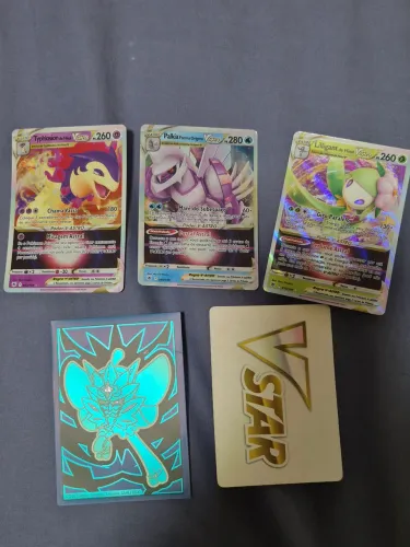 Cartas pokémon (40 reais as 3 e todas são 15)