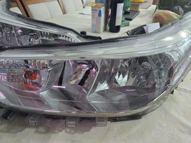 Farol yaris 2024 lado esquerdo motorista
