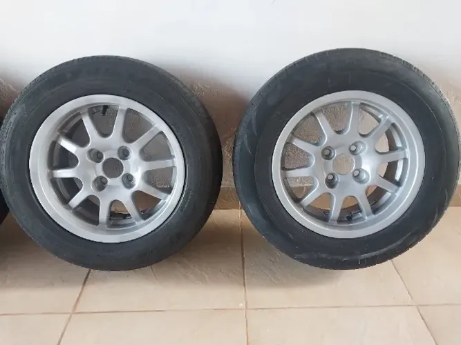 Rodas binno aranha 2 14x7 com pneus 60% 185/65/14 com calotas centrais binno 