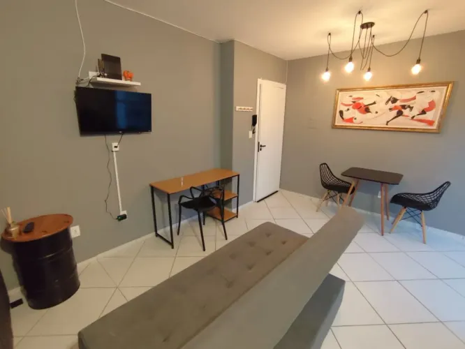 Apartamento com 1 dormitório para alugar, 31 m² por R$ 2.471,27/mês - Capoeiras - Florianó