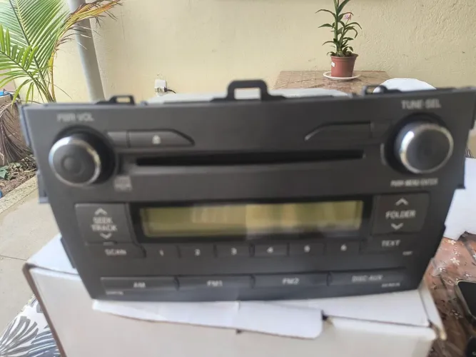 Vendo ou troco Rádio original do Corolla em excelente estado