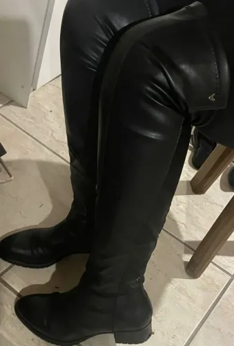 Par de botas cano alto