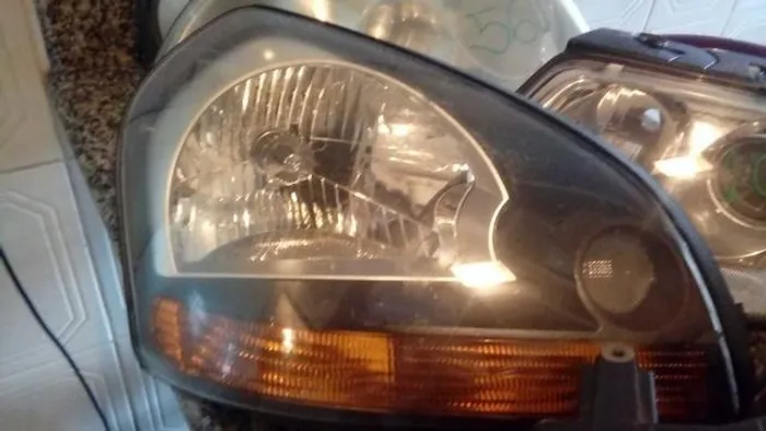 Farol direito huyndai tucson pisca amarela