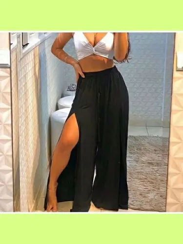 Vendo Calça Preta Feminina pantalona com Fenda M e G. Nova festas