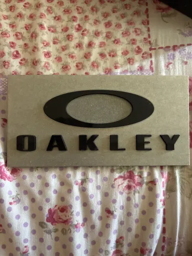 Placa decorativa Oakley
