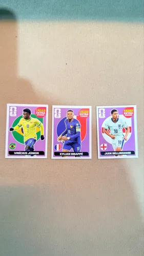 Figurinha Extra Legend Mbappé, Vini Júnior ou Jude Bellingham