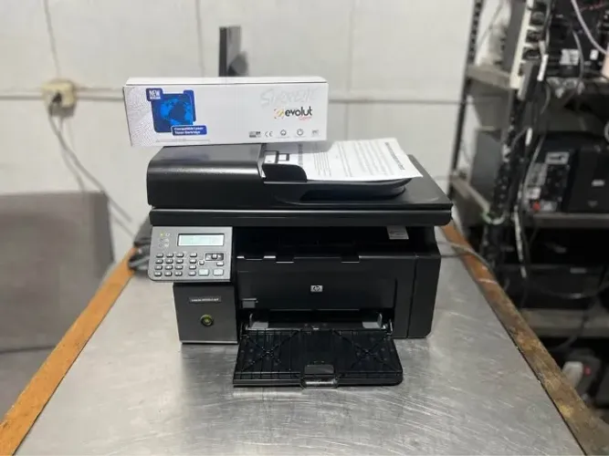 Impressora Multifuncional HP LaserJet M1212nf + Bind