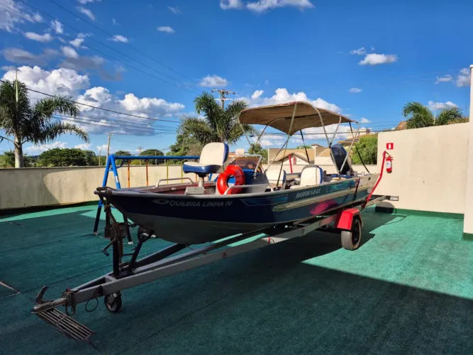 Lancha Levefort Marfin 6.0 + Motor popa 60hp + carreta rodoviária + motor elétrico 26 por