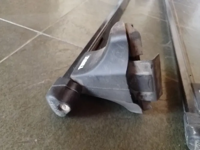Rack thule modelo antigo.
