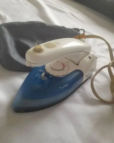 Ferro de viagem a vapor 