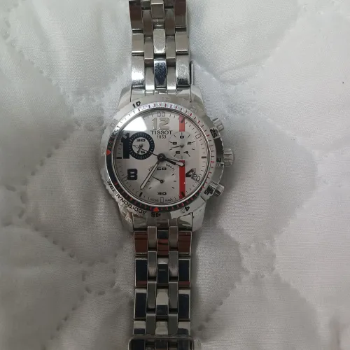 RELOGIO TISSOT 100% ORIGINAL ACOMPANHA CAIXA , LIVROS.