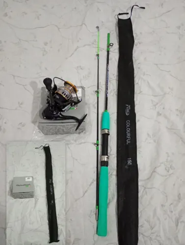 Vendo vara de pesca com molinete 6000