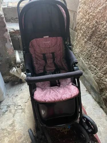 Carrinho voyage rosa de bebê 