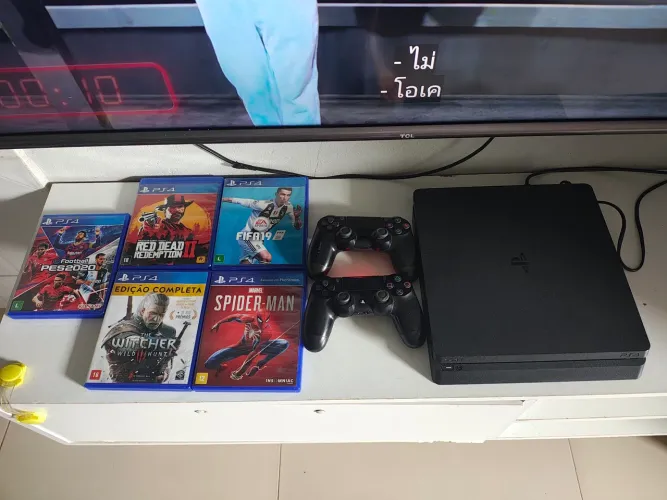 Playstation 4 + 2 controles + 5 jogos