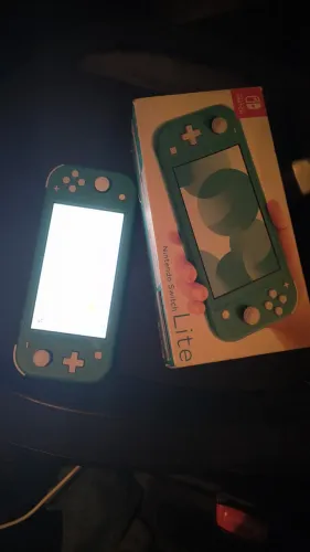 Nintendo switch lite 850 reais completo