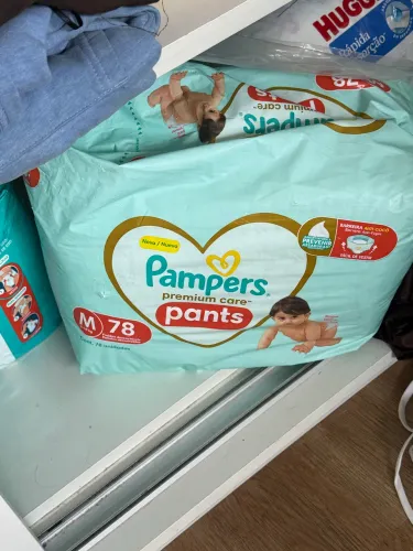 Fraldas premium Pampers Huggies 
