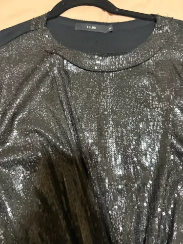 Blusa brilhosa Ellis
