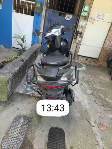 Moto muito nova estou vendendo por motivos de família,  