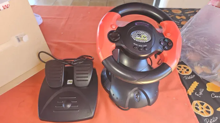 Volante e pedal para PS2.