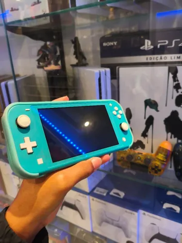 Nintendo switch lite azul semi-novo em perfeito estado de uso