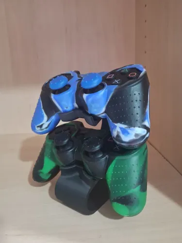 Dois controles originais de PS3