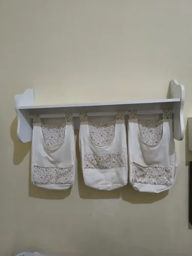 Prateleira porta fraldas