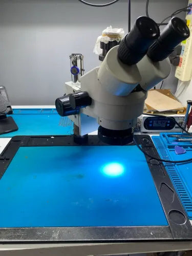 Microscópio Trinocular