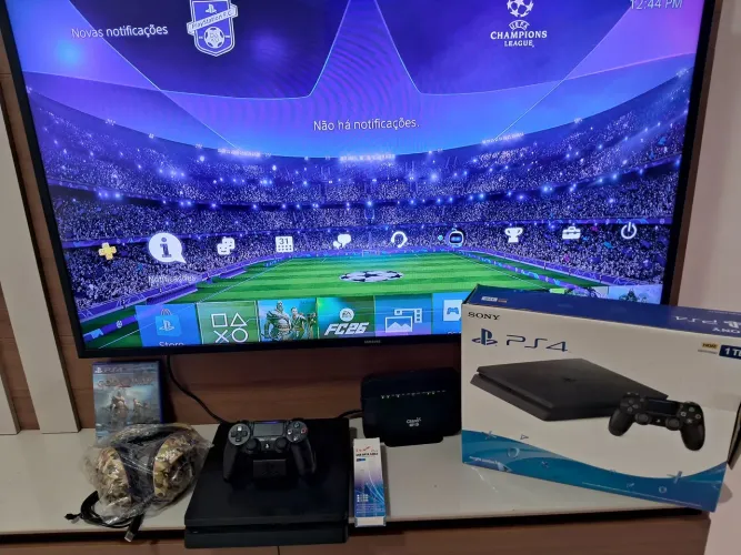 Ps4 slin 1TB com caixa + 1 jogo original e fone impecável
