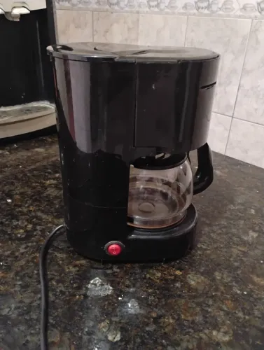 Cafeteira funcionando perfeitamente