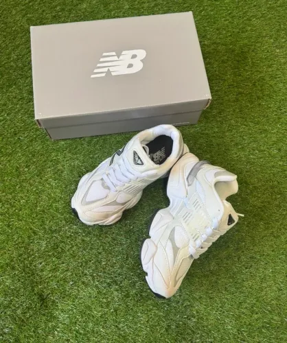 Tênis New balance tamanho 39 calça 38 .