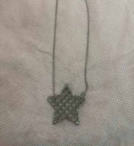 Bolsa mini bag metálica prata em formato de estrela