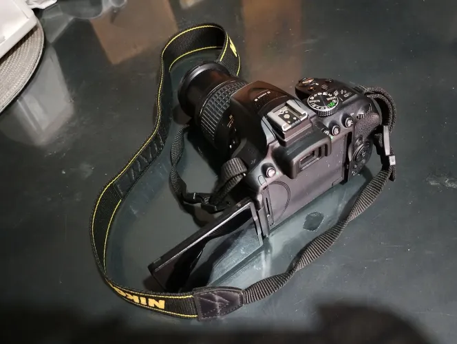 Máquina Nikon *58