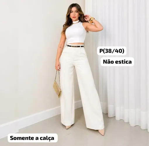 Calça pantalona branca Nova!<br>De alfaiataria com cinto fino preto<br>De 75$<br>Por 50,00$
