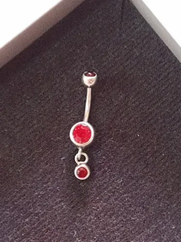 Piercing umbigo e sombrancelha