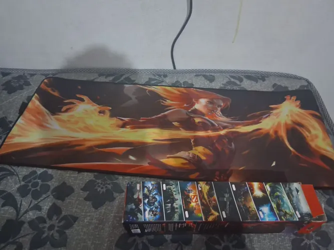 Vendo mouse pad gamer, zero, comprei e não gostei do desenho , mais e lindo.