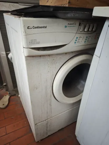Máquina de lavar com defeito