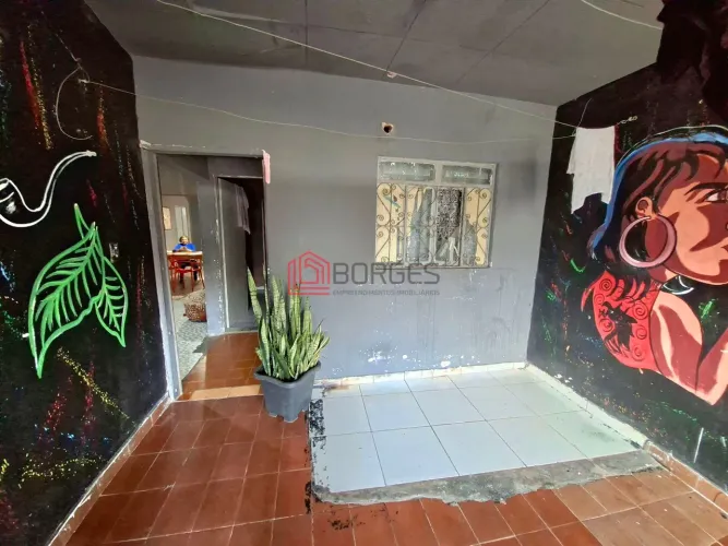 Casa Geminada com Ponto Comercial no Centro