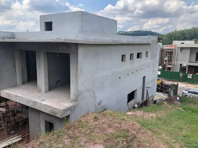Casa de condomínio para venda com 404 metros quadrados com 5 quartos